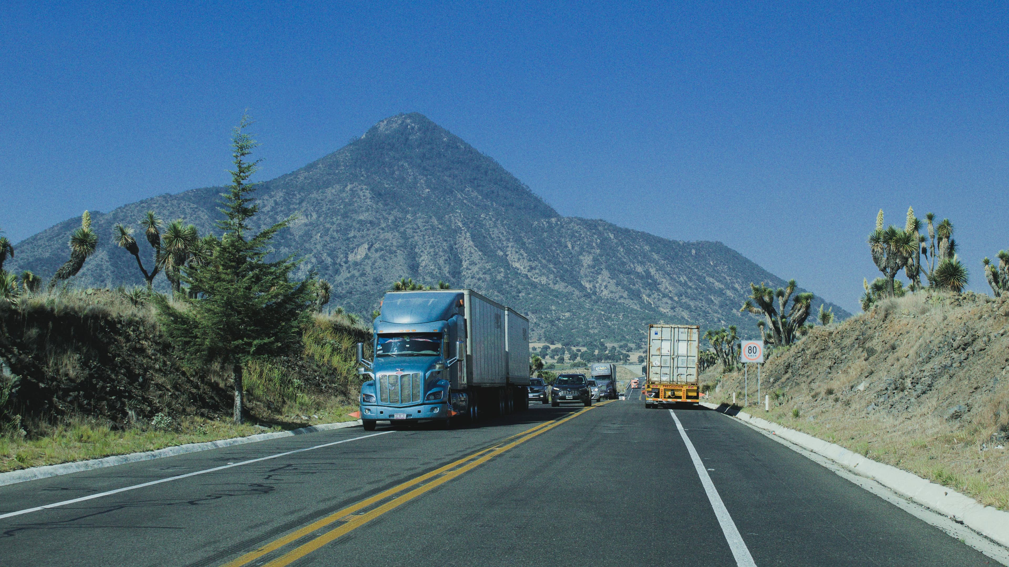 A truck passing through a facility gate